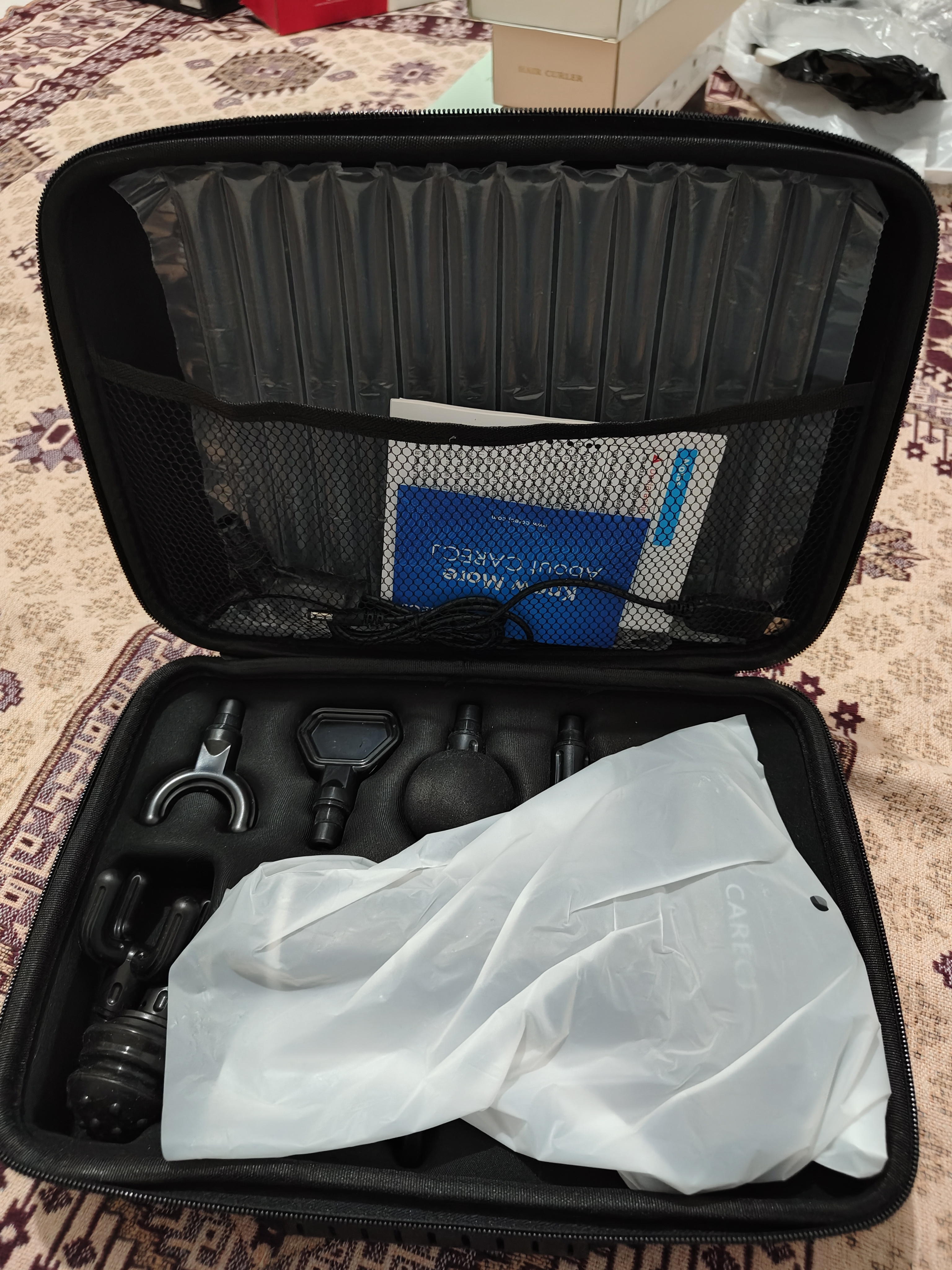 ماساژور تفنگی 32 حالته ی carecj مدل 6232.پک کامل همراه با کیف ضد ضربه